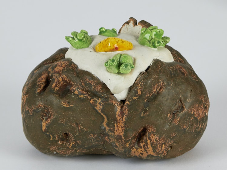 Artwork by David James Gilhooly,  A Baked Potato with Butter and Frogs