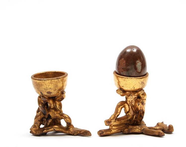 Artwork by Gathie Falk, Two Egg Cups with Single Egg