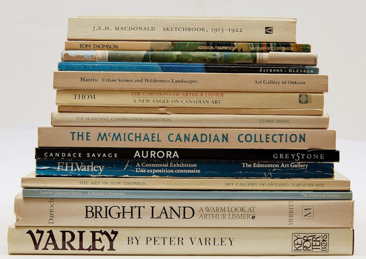 Artwork by  Books and Reference,  Fifteen Reference Books related to Tom Thomson and The Group of Seven (with transparency of the “Northern Lights” by Tom Thomson)